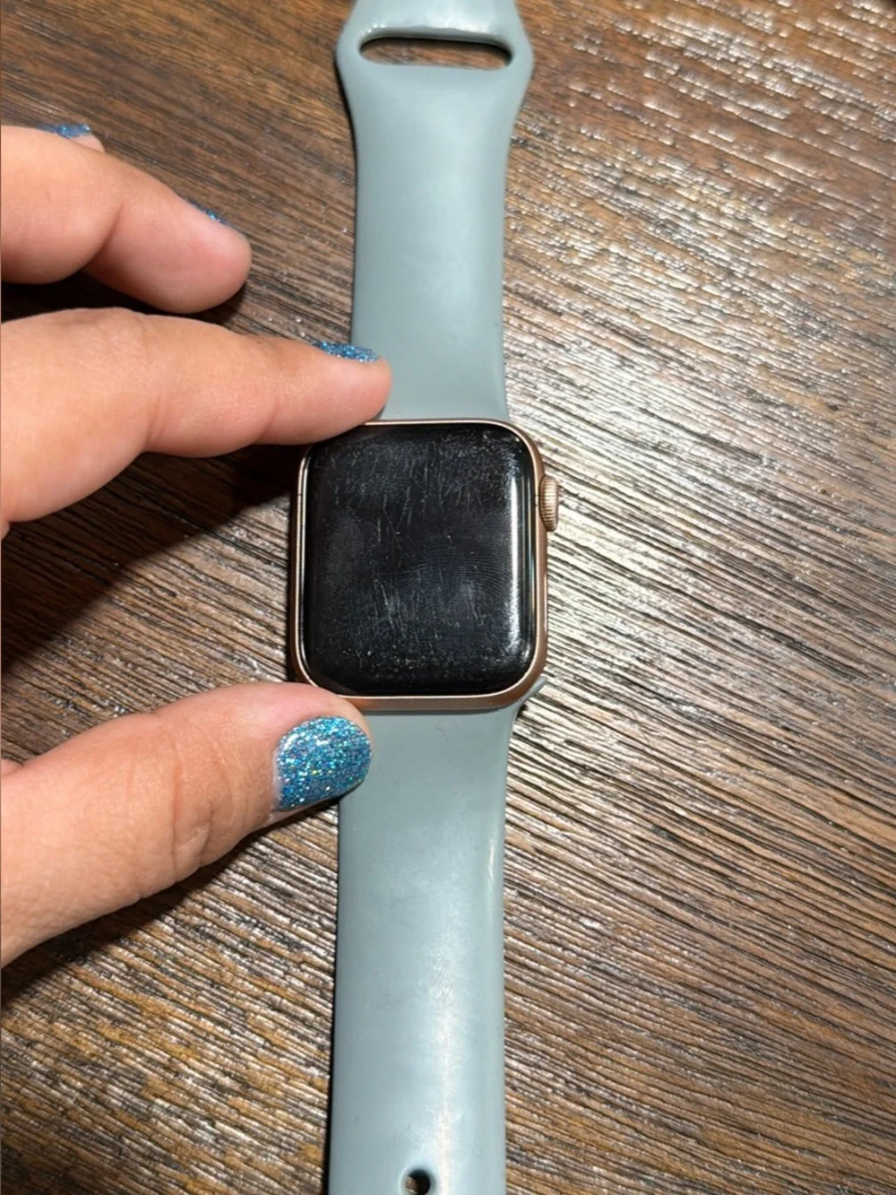 Apple Smartwatch with Pale Blue Silicone Band and Rose Gold Case